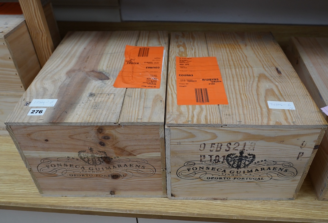 Two sealed wood cases of twelve bottles (twenty-four bottles) of 1992 Fonseca Vintage Port, in OWC's, purchased en primeur from The Wine Society. Condition - good